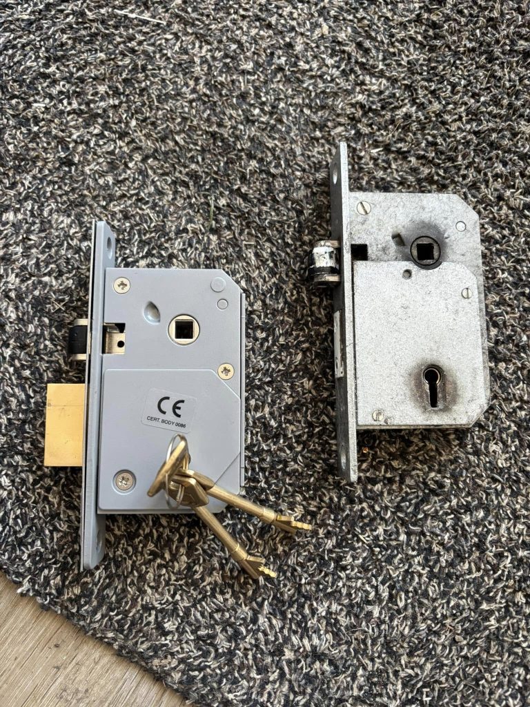 New vs old sash lock cases on the floor